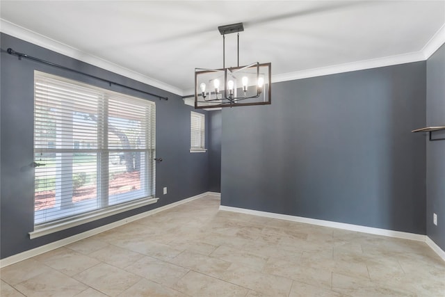 empty room featuring ornamental molding, a chandelier, and baseboards