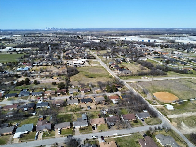 birds eye view of property with a residential view