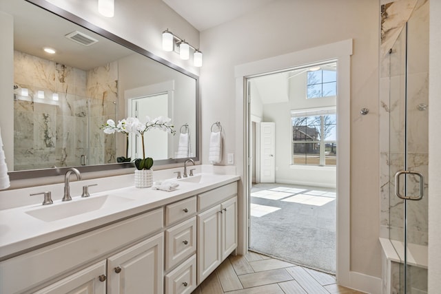 3830 Dalea Dr, Prosper, TX 75078 - full bath with a stall shower, a sink, baseboards, and double vanity