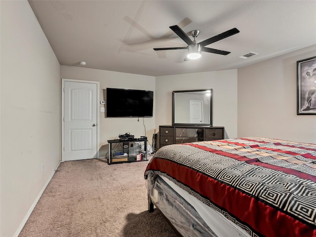 bedroom featuring baseboards, visible vents, ceiling fan, and carpet flooring