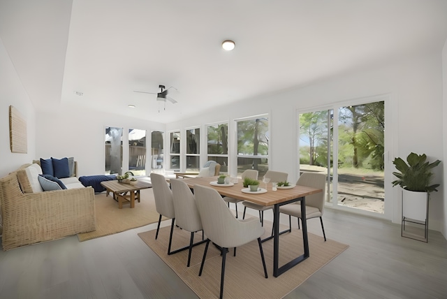 sunroom with visible vents and a ceiling fan