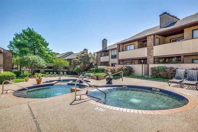 community pool featuring a patio