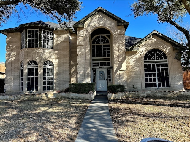 view of front of property with brick siding