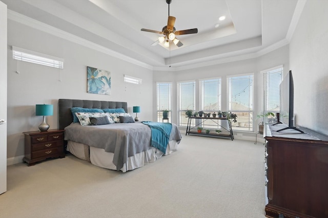 bedroom with carpet, a tray ceiling, ceiling fan, and recessed lighting