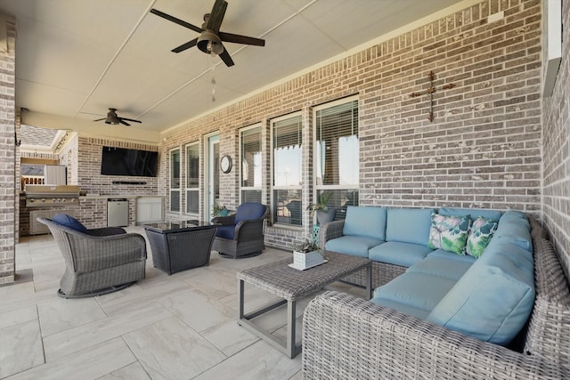 view of patio featuring an outdoor kitchen, a grill, an outdoor living space, and a ceiling fan