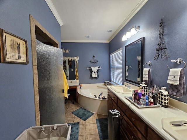 bathroom with a sink, a garden tub, tile patterned floors, double vanity, and ornamental molding