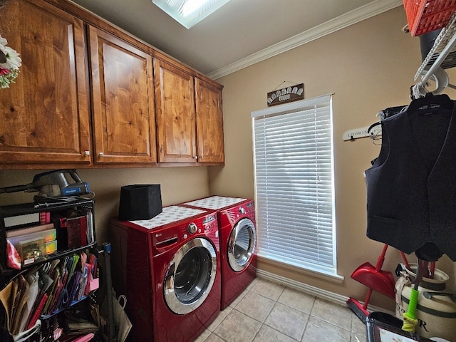 laundry room with separate washer and dryer, light tile patterned floors, cabinet space, baseboards, and crown molding
