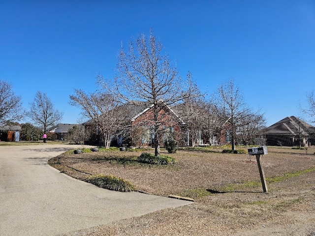 view of front of home with concrete driveway