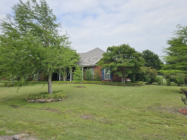 view of front of house with a front lawn