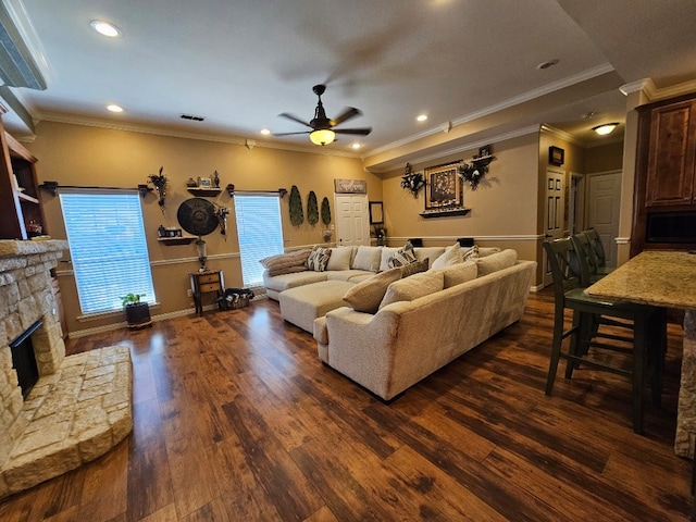 living area featuring recessed lighting, a fireplace, ceiling fan, visible vents, and dark wood finished floors