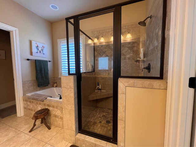 full bathroom featuring a stall shower, tile patterned flooring, and a bath