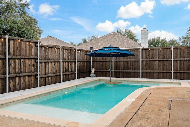 view of pool with a fenced in pool and a fenced backyard