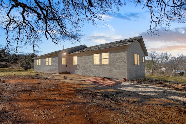 back of house featuring a patio