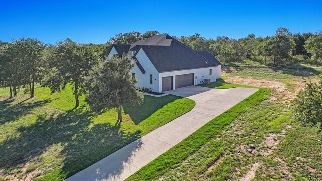 view of front of property featuring a front yard and stucco siding