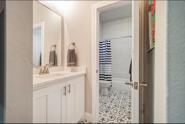 full bathroom with toilet, tile patterned flooring, shower / bathtub combination with curtain, and vanity