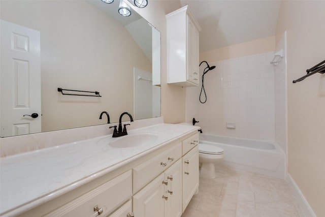 bathroom with baseboards, toilet, tile patterned flooring, vanity, and shower / washtub combination