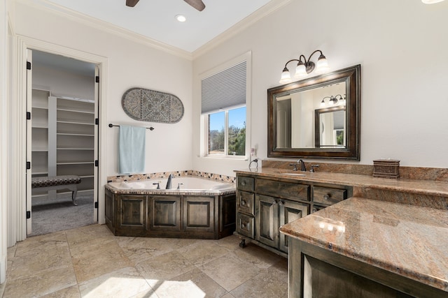 full bathroom with ornamental molding, a ceiling fan, recessed lighting, vanity, and a garden tub