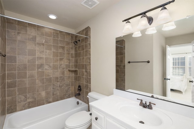 full bathroom featuring vanity, toilet, washtub / shower combination, and visible vents