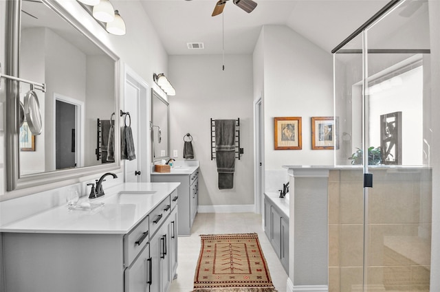 full bath with ceiling fan, two vanities, a sink, and visible vents