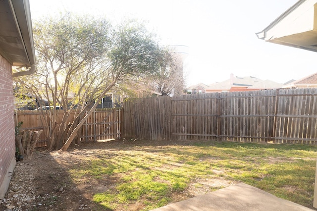 view of yard featuring a fenced backyard