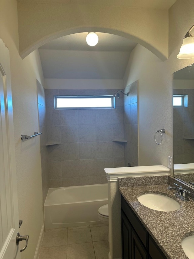 bathroom featuring double vanity, shower / bath combination, toilet, a sink, and tile patterned floors