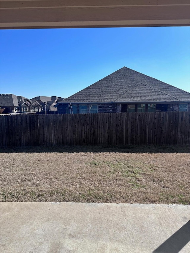 view of yard with fence