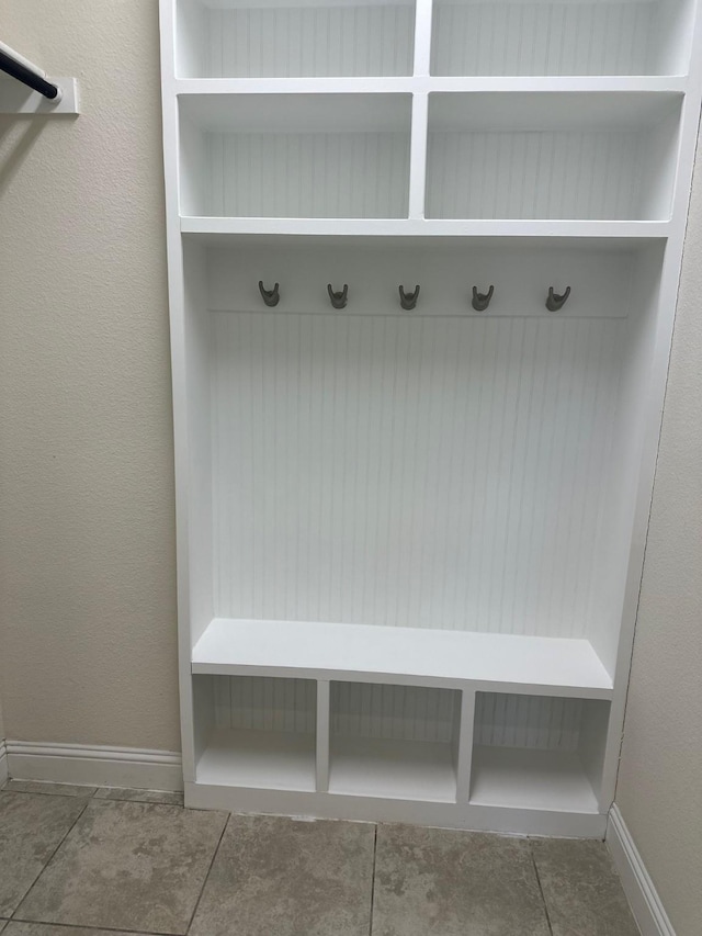 mudroom featuring baseboards