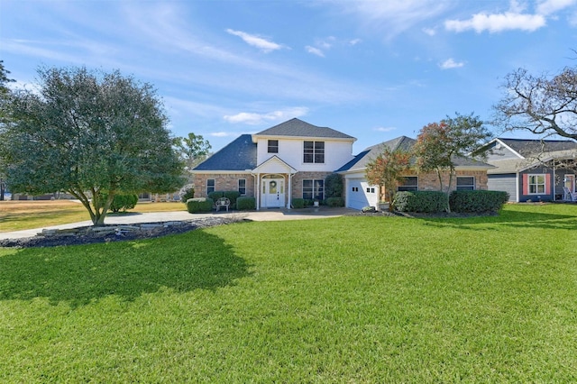 traditional-style house featuring a garage, concrete driveway, and a front lawn