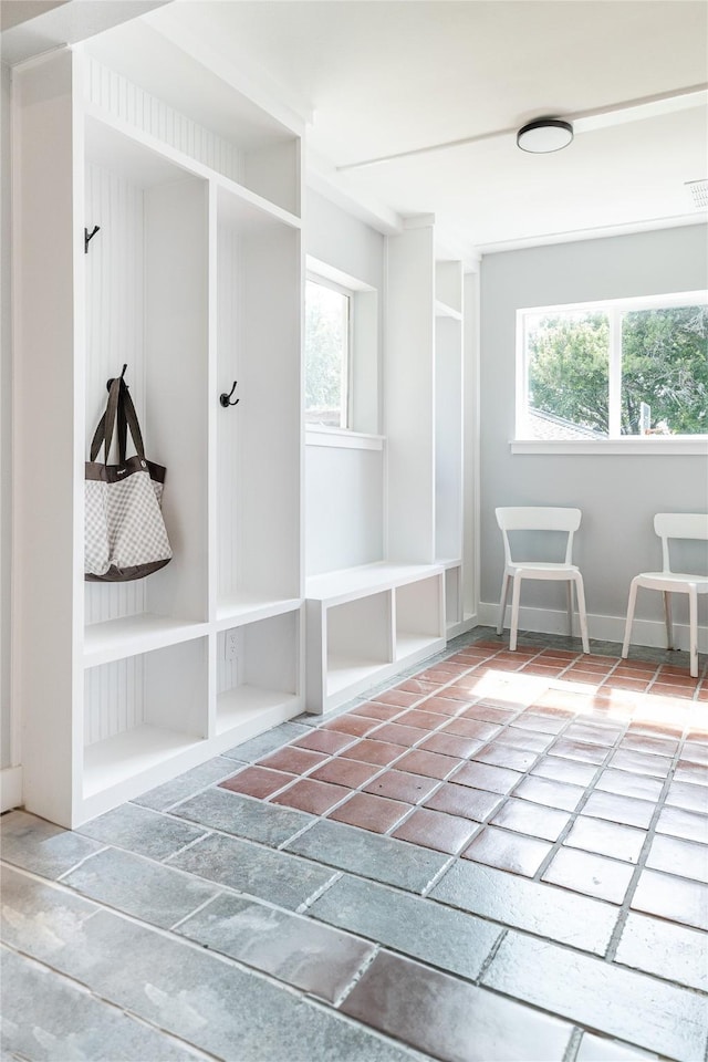 mudroom featuring visible vents and baseboards