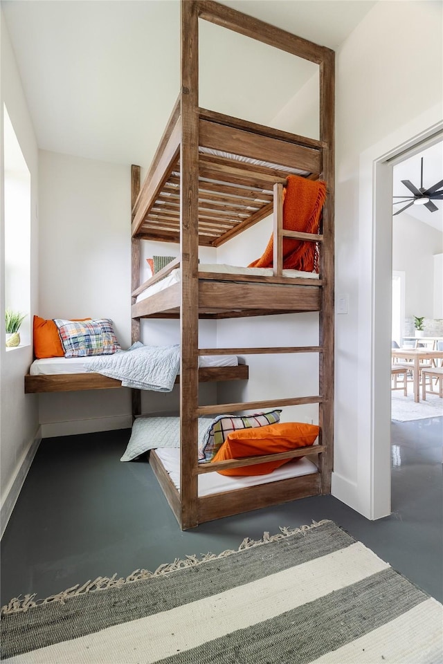 bedroom with finished concrete floors