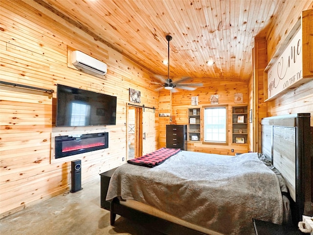 bedroom with a wall unit AC, wood walls, a barn door, and lofted ceiling