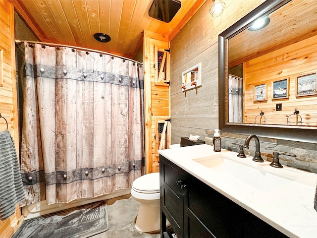 full bathroom featuring wood ceiling, wooden walls, toilet, and vanity