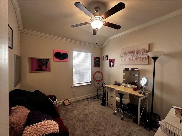 home office featuring baseboards, a ceiling fan, ornamental molding, vaulted ceiling, and carpet flooring