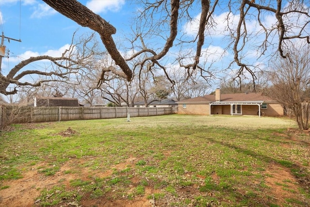 view of yard featuring a fenced backyard