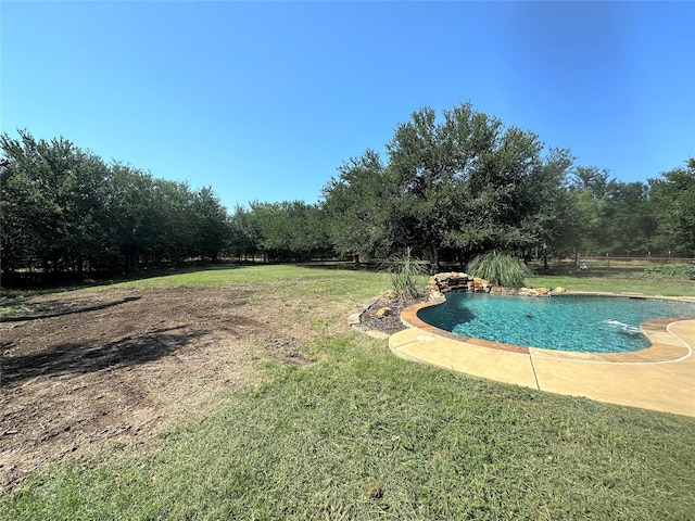 pool featuring a lawn