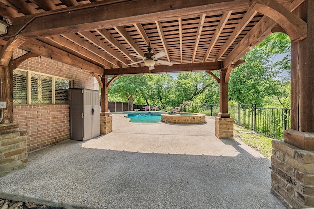 6800 Riverridge Rd, Fort Worth, TX 76116 - fenced backyard featuring ceiling fan, a pool with connected hot tub, and a patio
