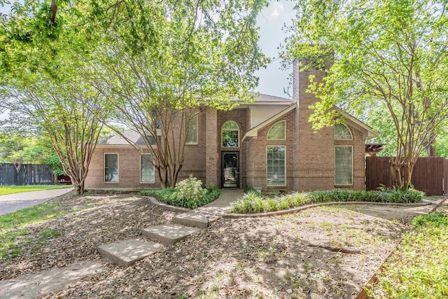 6800 Riverridge Rd, Fort Worth, TX 76116 - traditional-style home with brick siding and a chimney