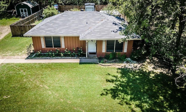 ranch-style house featuring a porch, board and batten siding, and a front lawn