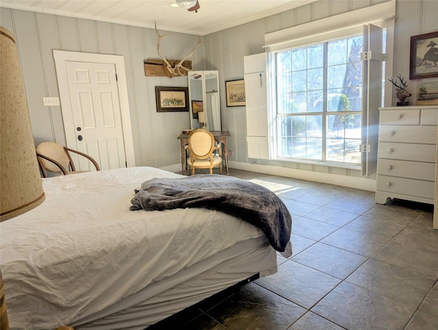 bedroom featuring crown molding