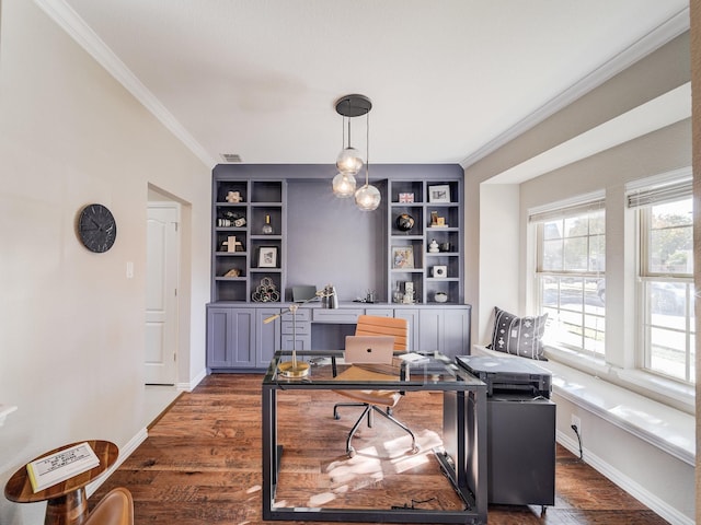 office area with ornamental molding, visible vents, baseboards, and wood finished floors