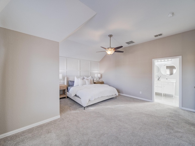 carpeted bedroom with lofted ceiling, visible vents, ceiling fan, and baseboards