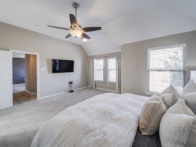 bedroom featuring lofted ceiling, ceiling fan, baseboards, and carpet flooring