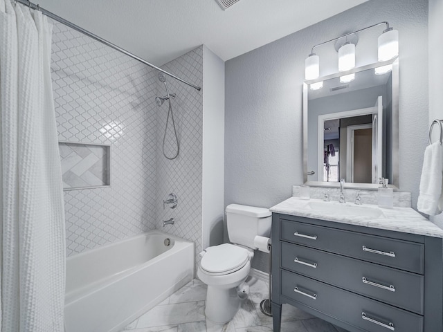 bathroom with shower / bath combo, a textured wall, toilet, marble finish floor, and vanity