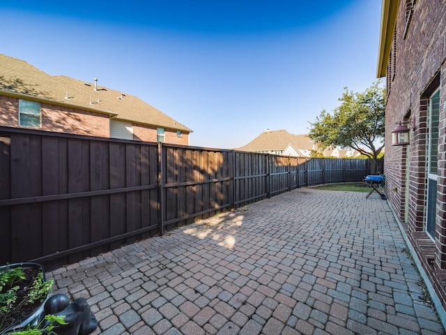 view of patio with a fenced backyard