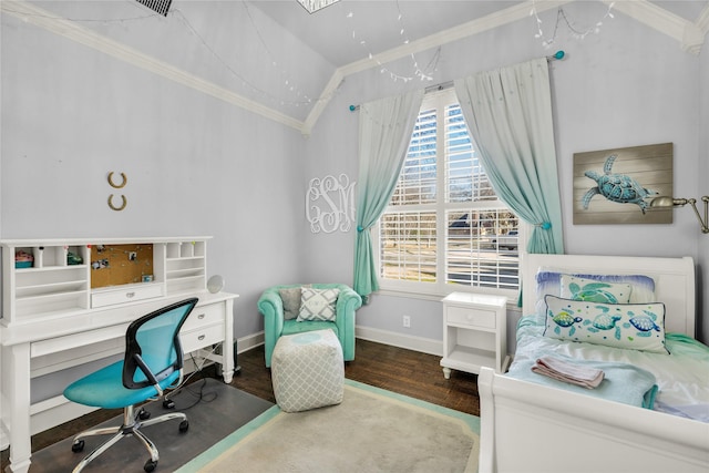 office area with baseboards, vaulted ceiling, crown molding, and wood finished floors