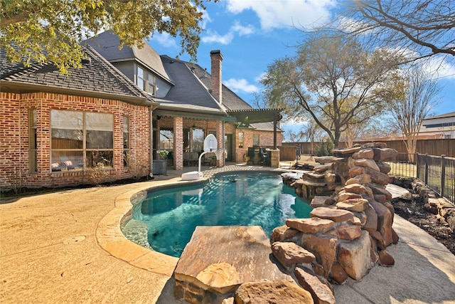 view of swimming pool featuring a patio area, a fenced backyard, and a fenced in pool