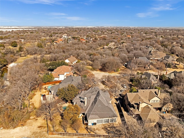 birds eye view of property with a residential view