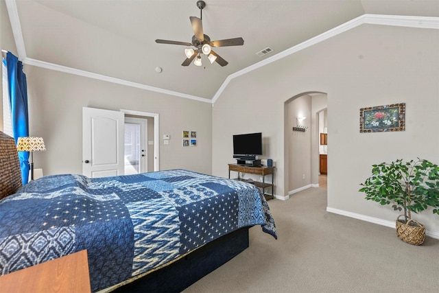 carpeted bedroom with visible vents, arched walkways, vaulted ceiling, and crown molding