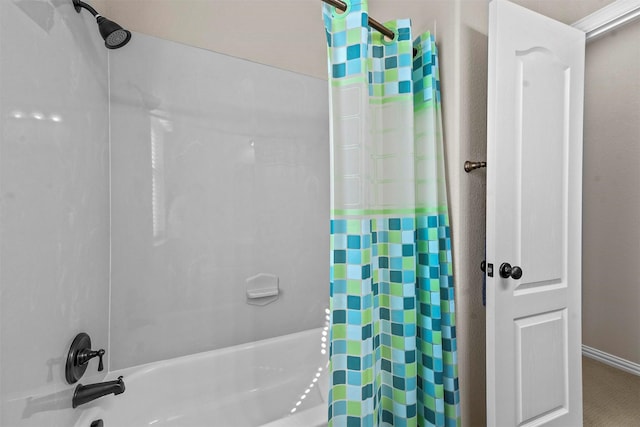 bathroom with shower / bath combo