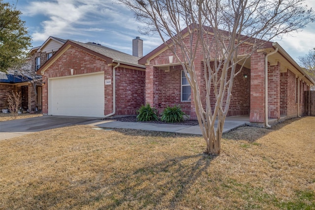 ranch-style home with driveway, brick siding, a chimney, and a front lawn